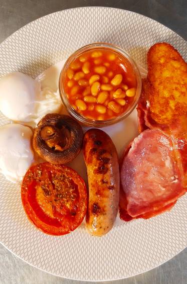 Photo of a cooked full english breakfast.